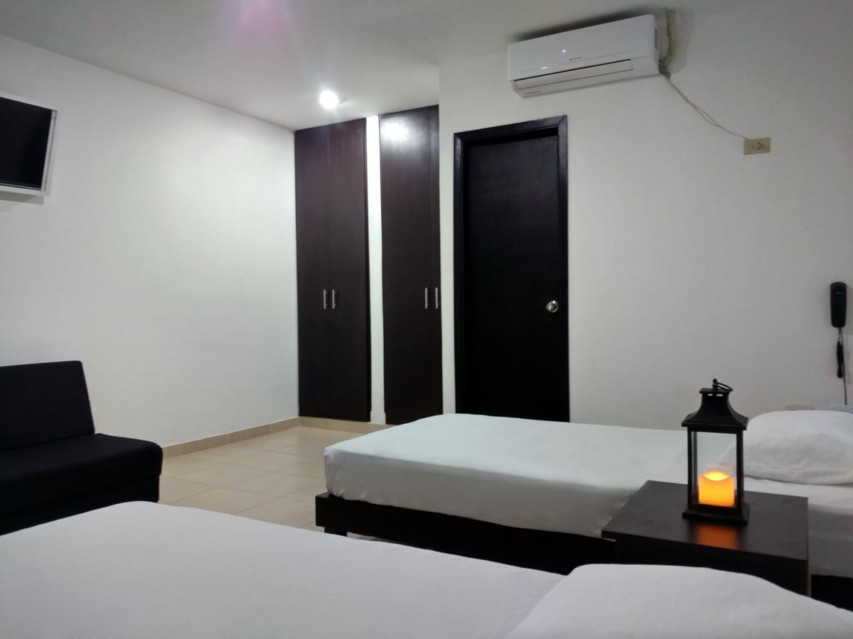 Hotel El Emigrante Пуэрто-Коломбия Экстерьер фото